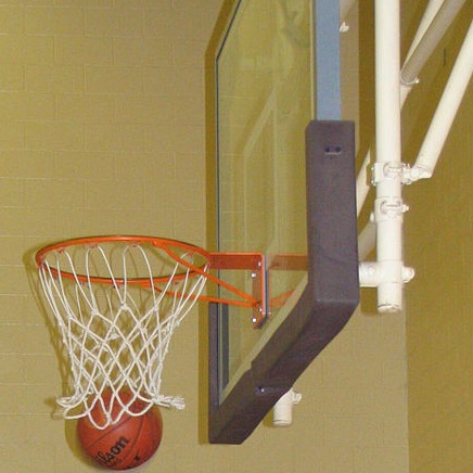 A basketball passing through the hoop
